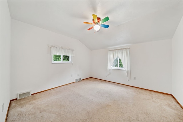 1541 Sugarloaf, Plum Boro, PA 15239 - additional living space featuring healthy amount of natural light, carpet, vaulted ceiling, and a ceiling fan