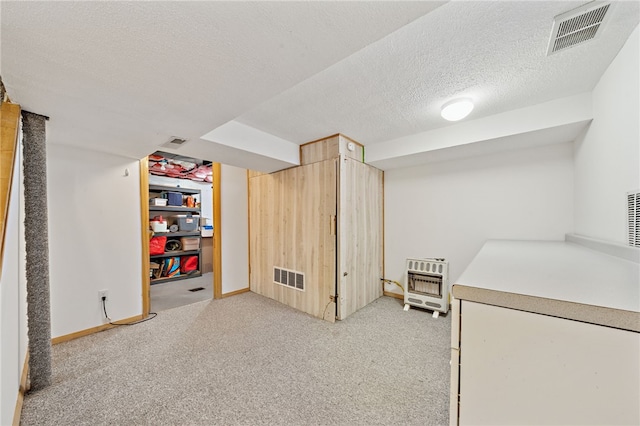 1541 Sugarloaf, Plum Boro, PA 15239 - finished basement featuring heating unit, light colored carpet, and a textured ceiling