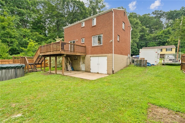 1541 Sugarloaf, Plum Boro, PA 15239 - rear view of house featuring a deck, stairs, a lawn, and a patio