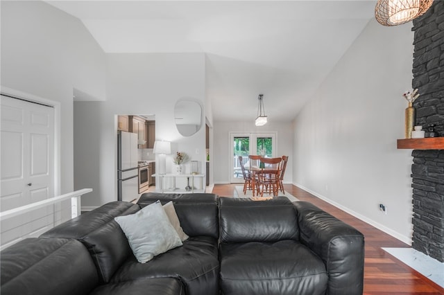 231 Loretta Dr, Monroeville, PA 15146 - living area featuring dark wood-style floors, high vaulted ceiling, and a fireplace