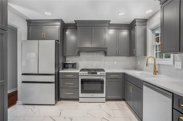 231 Loretta Dr, Monroeville, PA 15146 - kitchen with stainless steel appliances, light marble finish flooring, light stone counters, tasteful backsplash, and recessed lighting