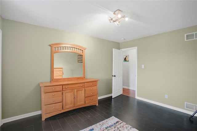 231 Loretta Dr, Monroeville, PA 15146 - bedroom with dark wood-type flooring and baseboards