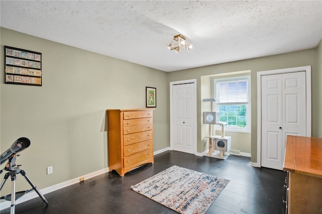 231 Loretta Dr, Monroeville, PA 15146 - entryway with a textured ceiling and dark wood-style flooring
