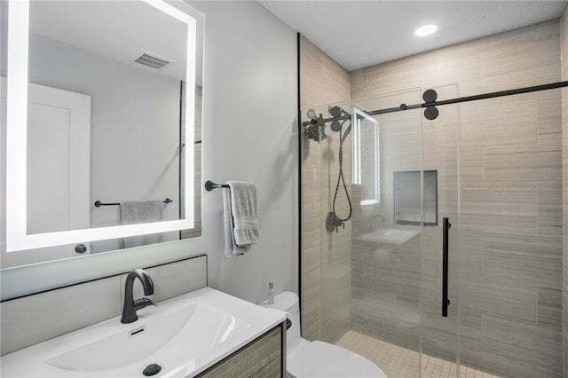 231 Loretta Dr, Monroeville, PA 15146 - bathroom featuring vanity, a stall shower, and recessed lighting