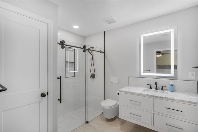 231 Loretta Dr, Monroeville, PA 15146 - full bath featuring a tile shower, vanity, ceiling fan, and decorative backsplash