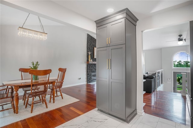 231 Loretta Dr, Monroeville, PA 15146 - dining area with a ceiling fan and light marble finish floors