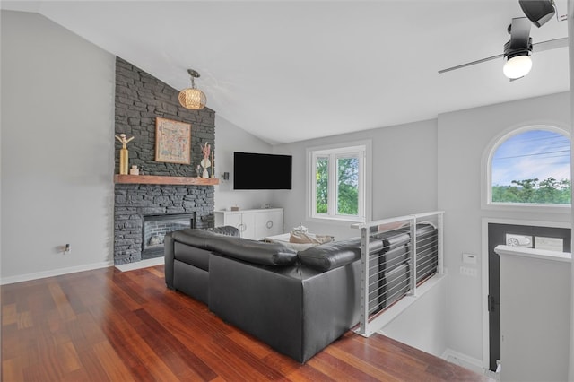 231 Loretta Dr, Monroeville, PA 15146 - living room featuring lofted ceiling, wood finished floors, a stone fireplace, and ceiling fan