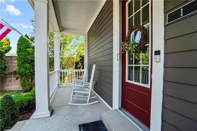 1 Riverfront St, Oakmont, PA 15139 - doorway to property featuring covered porch