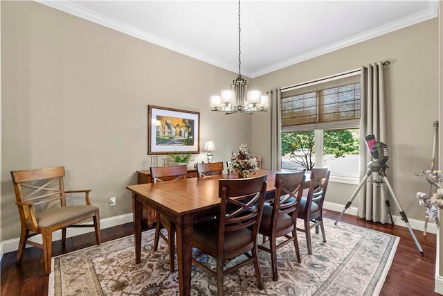 1 Riverfront St, Oakmont, PA 15139 - dining area with a chandelier, crown molding, and dark wood-type flooring