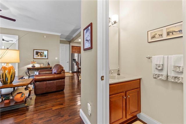 1 Riverfront St, Oakmont, PA 15139 - bathroom featuring a ceiling fan, ornamental molding, wood finished floors, and vanity