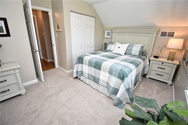 121 Sedeca Dr, North Strabane, PA 15317 - bedroom with light carpet, a closet, and lofted ceiling