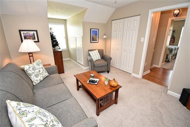 121 Sedeca Dr, North Strabane, PA 15317 - living area featuring light colored carpet and vaulted ceiling