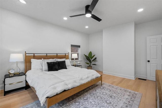 5110 Duncan St, Lawrenceville, PA 15201 - bedroom featuring recessed lighting, wood finished floors, and a ceiling fan