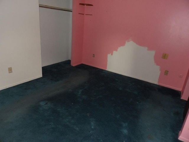 319 Robin Dr, Franklin, PA 16323 - unfurnished bedroom featuring dark carpet and a closet