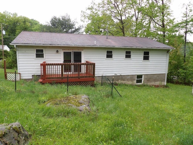 319 Robin Dr, Franklin, PA 16323 - rear view of house featuring a deck, a shingled roof, and a lawn
