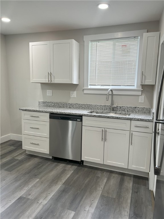 122 Church Ave, Shaler, PA 15116 - kitchen with stainless steel dishwasher, recessed lighting, white cabinetry, light stone counters, and dark wood-style floors