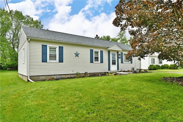114 10th St, Pymatuning Twp, PA 16125 - view of front of property with a front yard, a chimney, and roof with shingles