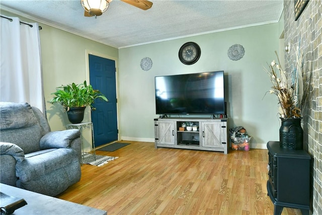 114 10th St, Pymatuning Twp, PA 16125 - living area featuring ornamental molding, wood finished floors, ceiling fan, and a textured ceiling