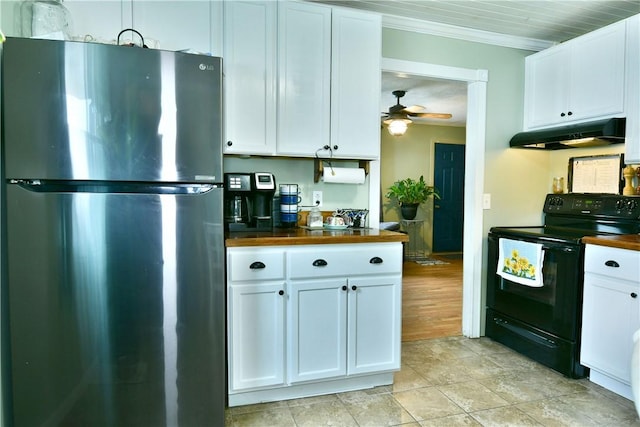 114 10th St, Pymatuning Twp, PA 16125 - kitchen with freestanding refrigerator, electric range, under cabinet range hood, wooden counters, and crown molding