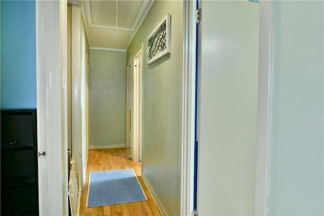114 10th St, Pymatuning Twp, PA 16125 - hallway featuring attic access, wood finished floors, and ornamental molding