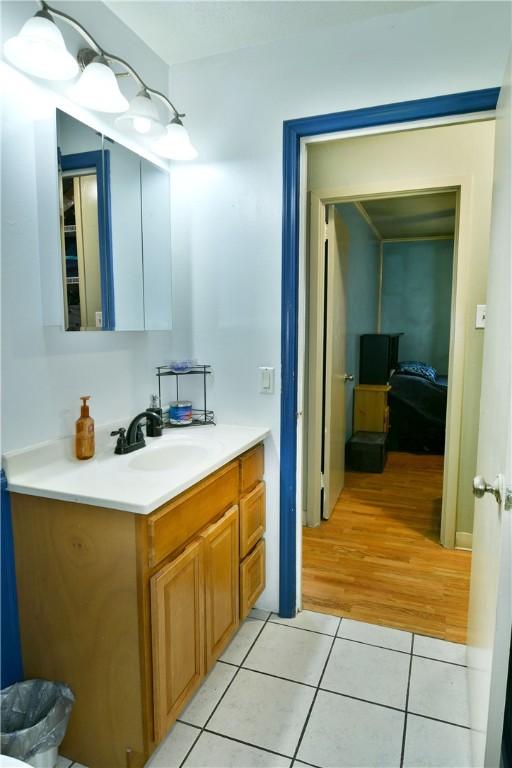114 10th St, Pymatuning Twp, PA 16125 - bathroom with vanity and tile patterned floors