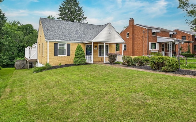 2514 Oakwood Rd, Shaler, PA 15116 - view of front of property with brick siding, covered porch, roof with shingles, and a chimney