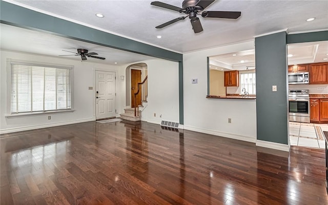 2514 Oakwood Rd, Shaler, PA 15116 - unfurnished living room with ceiling fan, hardwood / wood-style floors, recessed lighting, ornamental molding, and arched walkways