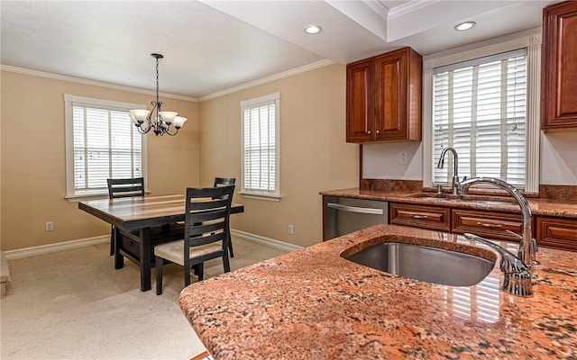 2514 Oakwood Rd, Shaler, PA 15116 - kitchen with stainless steel dishwasher, crown molding, light stone counters, decorative light fixtures, and light colored carpet