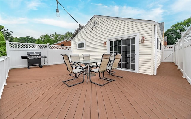 2514 Oakwood Rd, Shaler, PA 15116 - wooden terrace with area for grilling, outdoor dining space, a fenced backyard, and a gate