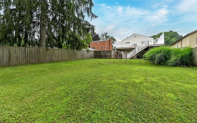2514 Oakwood Rd, Shaler, PA 15116 - fenced backyard featuring stairs and a wooden deck