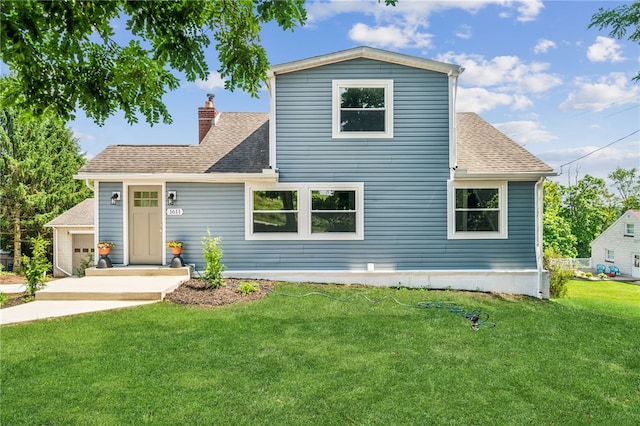 1611 Guffey Rd, North Huntingdon, PA 15642 - traditional-style home with a shingled roof, a front yard, and a chimney