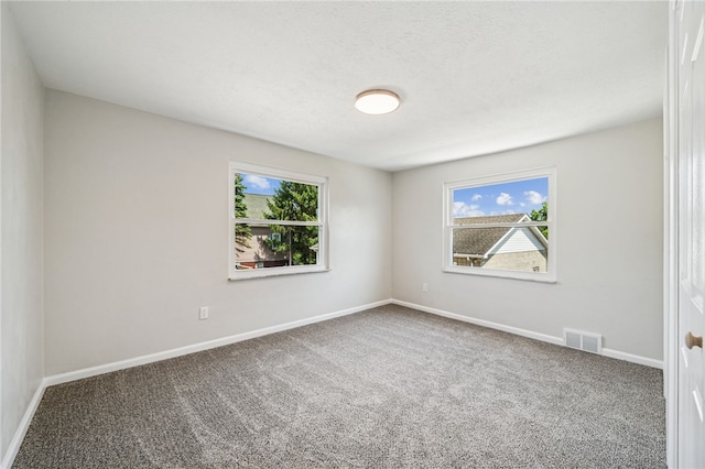 1611 Guffey Rd, North Huntingdon, PA 15642 - empty room with healthy amount of natural light and carpet