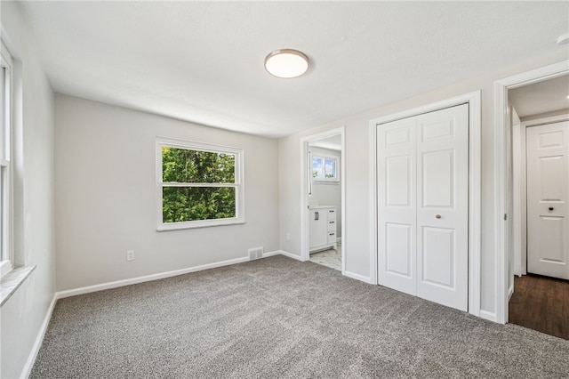 1611 Guffey Rd, North Huntingdon, PA 15642 - unfurnished bedroom featuring carpet floors and a closet