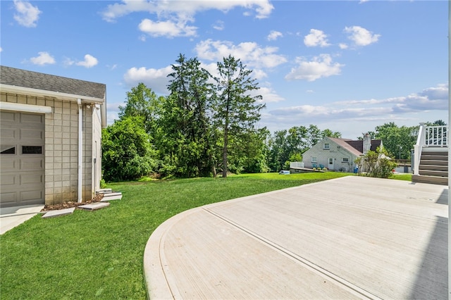 1611 Guffey Rd, North Huntingdon, PA 15642 - view of grassy yard featuring a garage and stairs