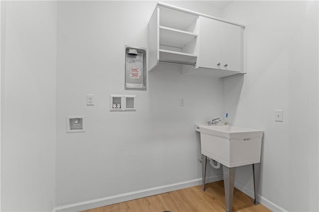 2219 Lebanon Dr, Elizabeth Twp/Boro, PA 15135 - washroom with cabinet space, light wood-type flooring, and hookup for a washing machine