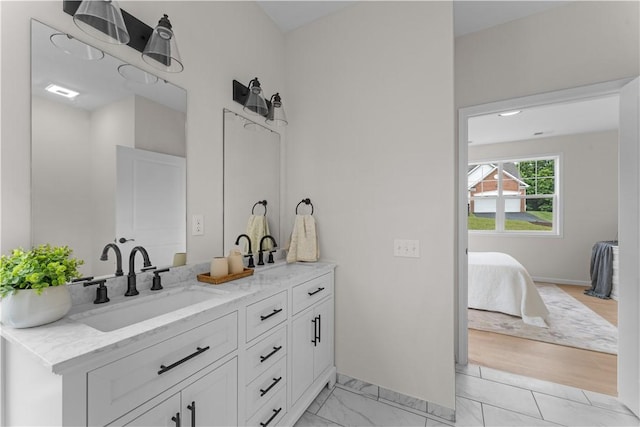 2219 Lebanon Dr, Elizabeth Twp/Boro, PA 15135 - ensuite bathroom featuring double vanity and baseboards