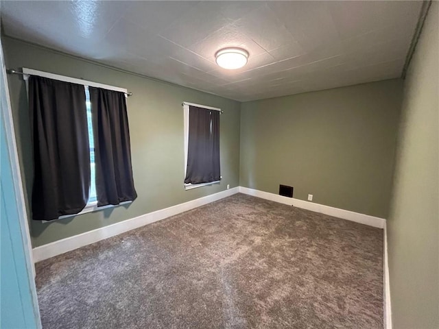 702 Sellers Ave, Jeannette, PA 15644 - carpeted empty room with baseboards