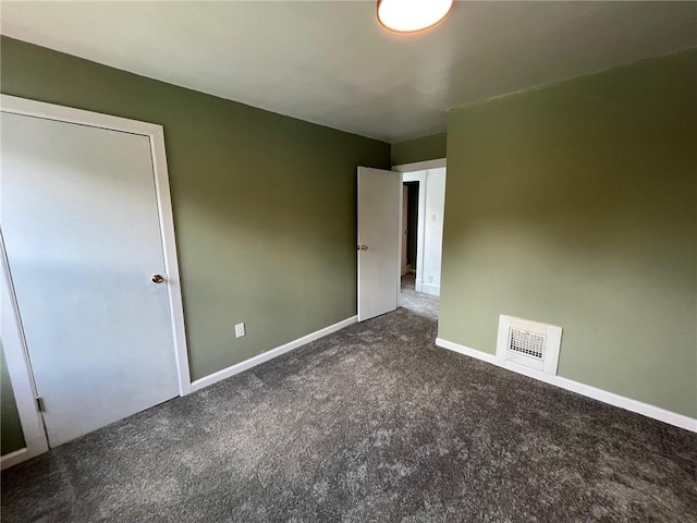 702 Sellers Ave, Jeannette, PA 15644 - unfurnished bedroom with carpet and baseboards