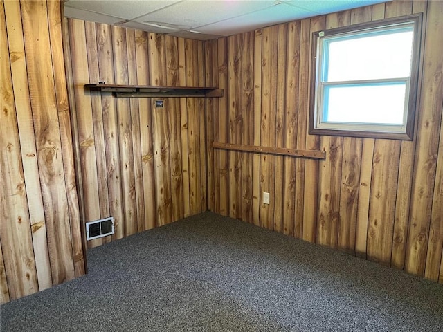 702 Sellers Ave, Jeannette, PA 15644 - empty room with carpet floors and wood walls