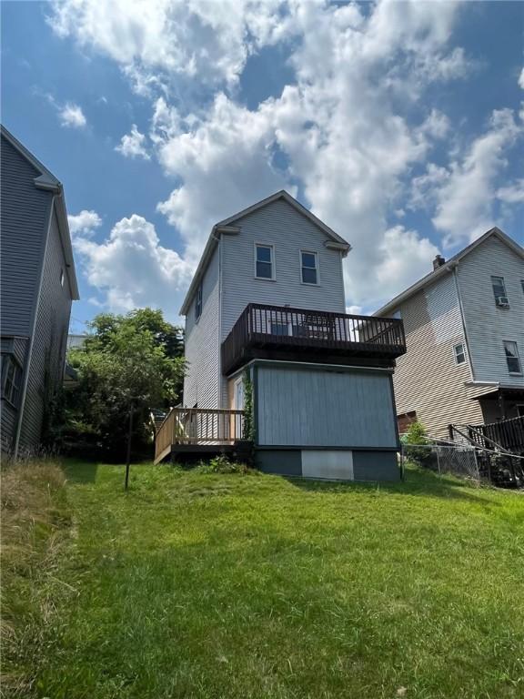 702 Sellers Ave, Jeannette, PA 15644 - rear view of house with a wooden deck