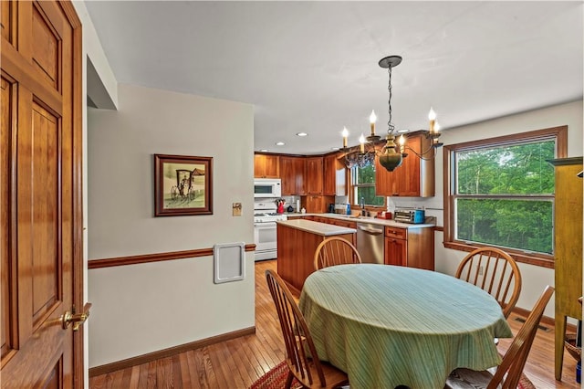 44 Stonehenge Dr, South Strabane, PA 15301 - dining area with a chandelier, hardwood / wood-style flooring, and recessed lighting
