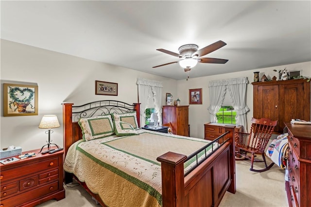 44 Stonehenge Dr, South Strabane, PA 15301 - bedroom with light colored carpet and ceiling fan