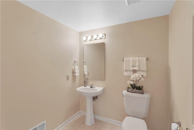 103 Boxwood Ct, Peters Twp, PA 15317 - bathroom with toilet and tile patterned flooring