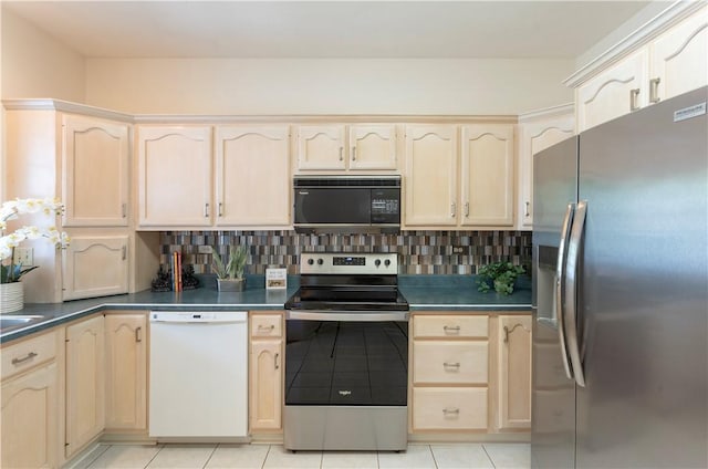 103 Boxwood Ct, Peters Twp, PA 15317 - kitchen featuring stainless steel appliances, dark countertops, and backsplash