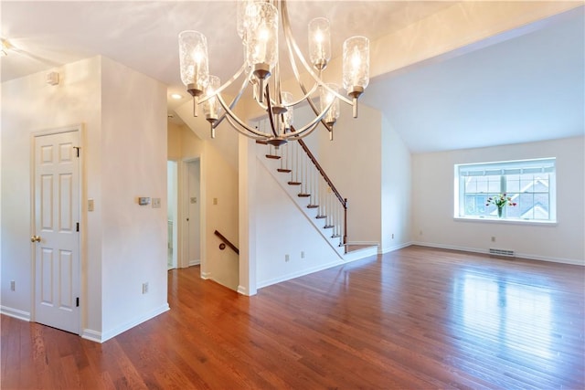 103 Boxwood Ct, Peters Twp, PA 15317 - unfurnished room with a chandelier, wood finished floors, and vaulted ceiling