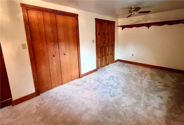 423 Bonniebrook Rd, Summit Twp, PA 16002 - unfurnished bedroom featuring carpet floors, a closet, and a ceiling fan