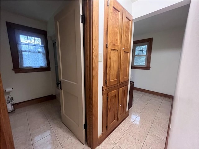 423 Bonniebrook Rd, Summit Twp, PA 16002 - corridor with light tile patterned flooring and baseboards