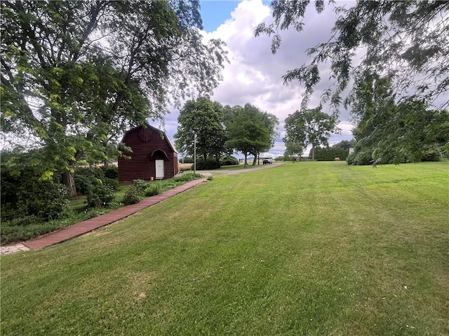 423 Bonniebrook Rd, Summit Twp, PA 16002 - view of green lawn featuring a barn and an outbuilding