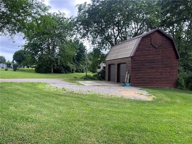 423 Bonniebrook Rd, Summit Twp, PA 16002 - view of grassy yard with an outdoor structure and a garage