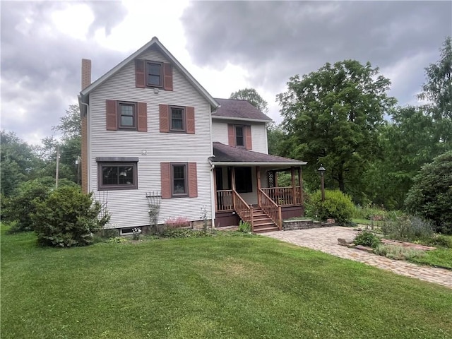 423 Bonniebrook Rd, Summit Twp, PA 16002 - rear view of house featuring a chimney, covered porch, and a lawn